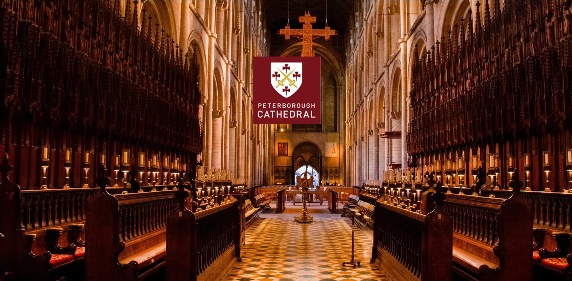 Charities - The Peterborough Cathedral Logo Displayed Over An Image Of The Cathedrals Interior