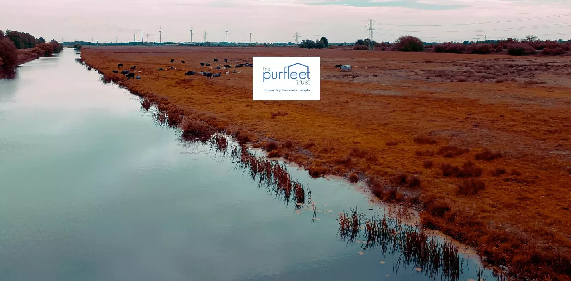Charities - The Purfleet Trust Logo Displayed Over An Image Of The River Nene