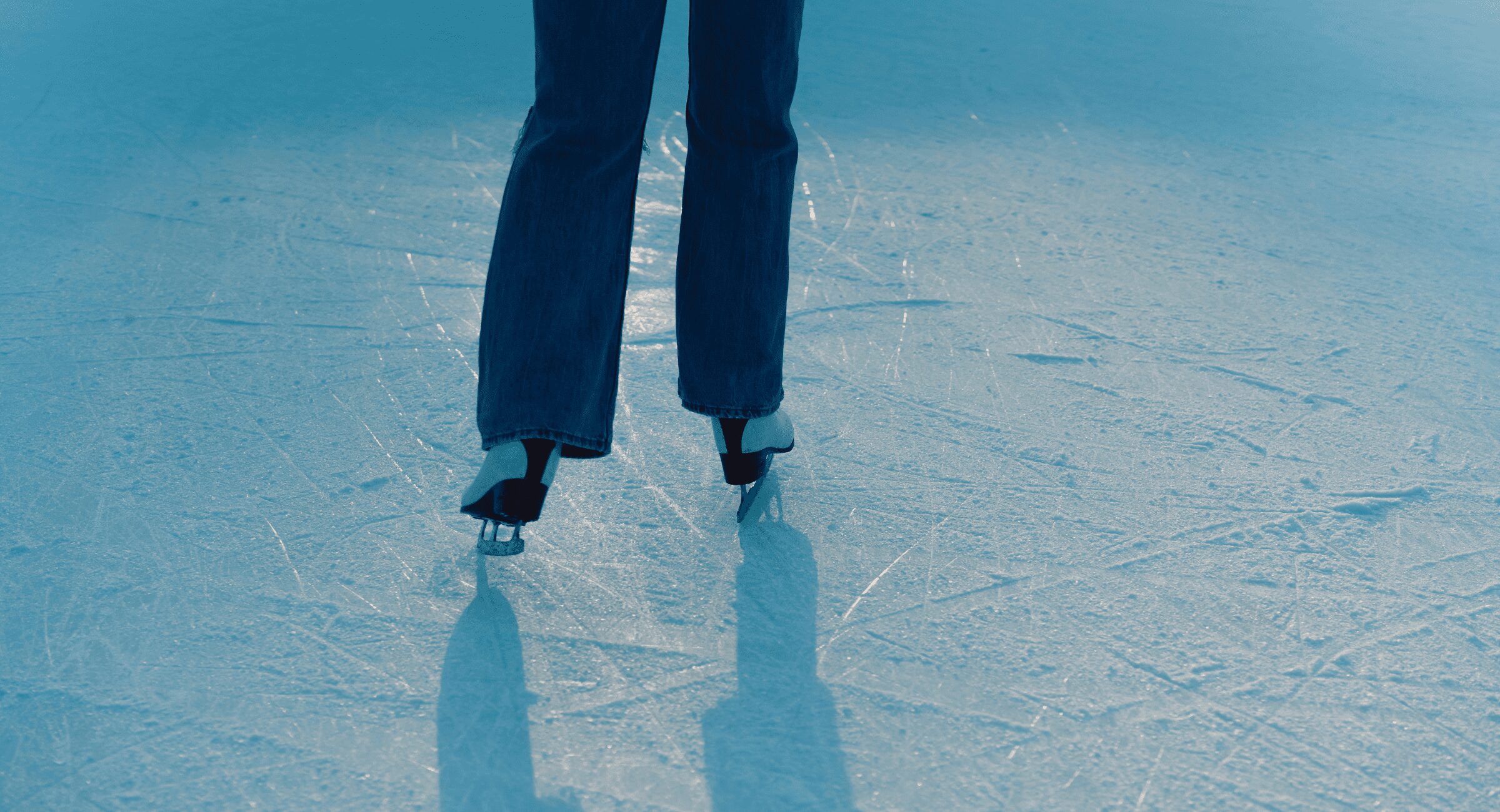 PHoto of a womans legs ice skating - depicting the personal allowance freeze