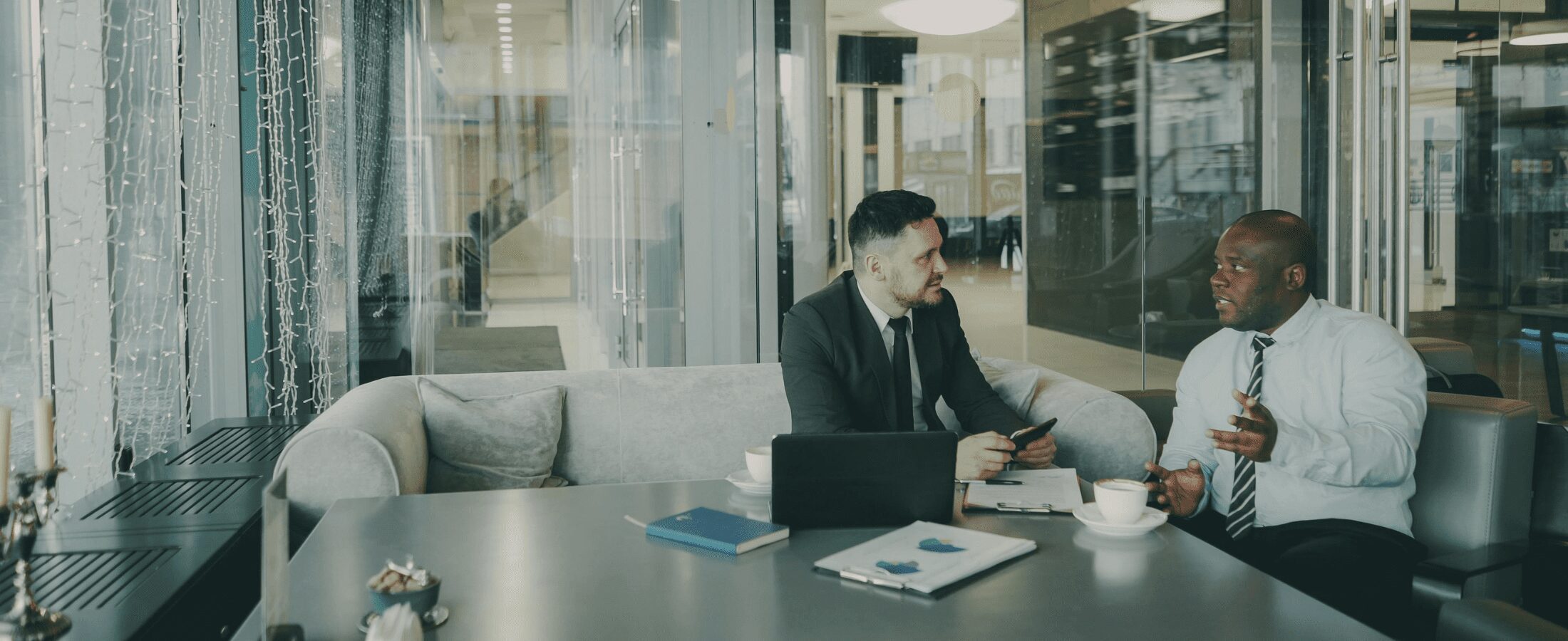 A financial adviser sitting with their client having a financial review meeting