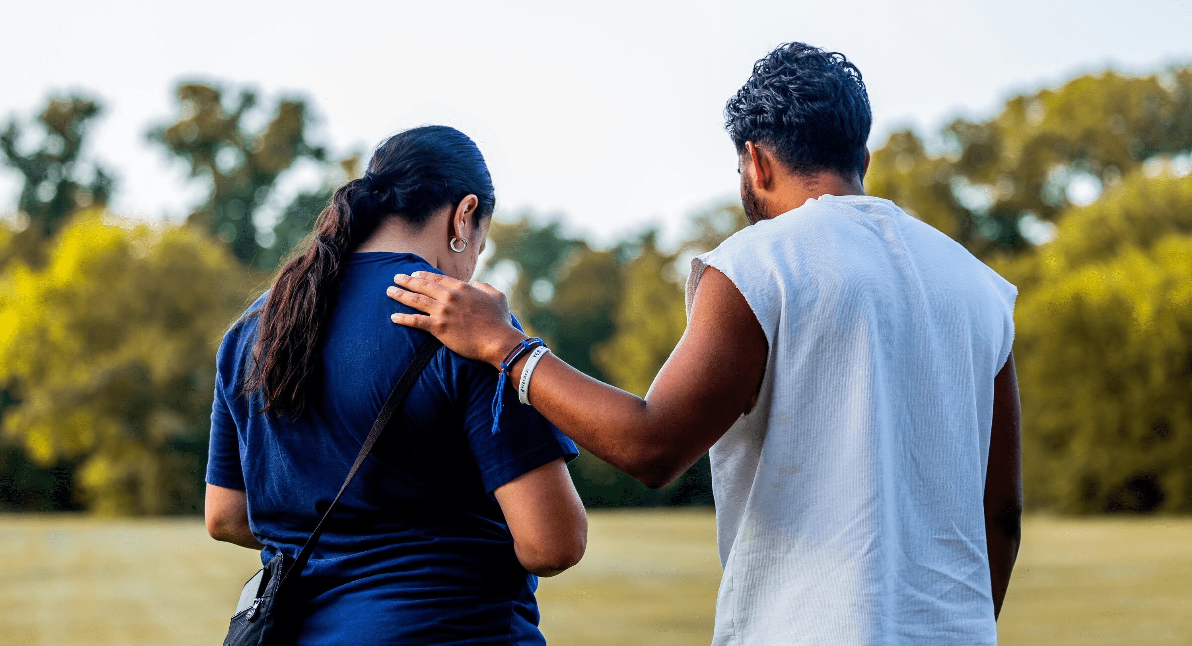 Two people supporting each other with financial planning support for life events