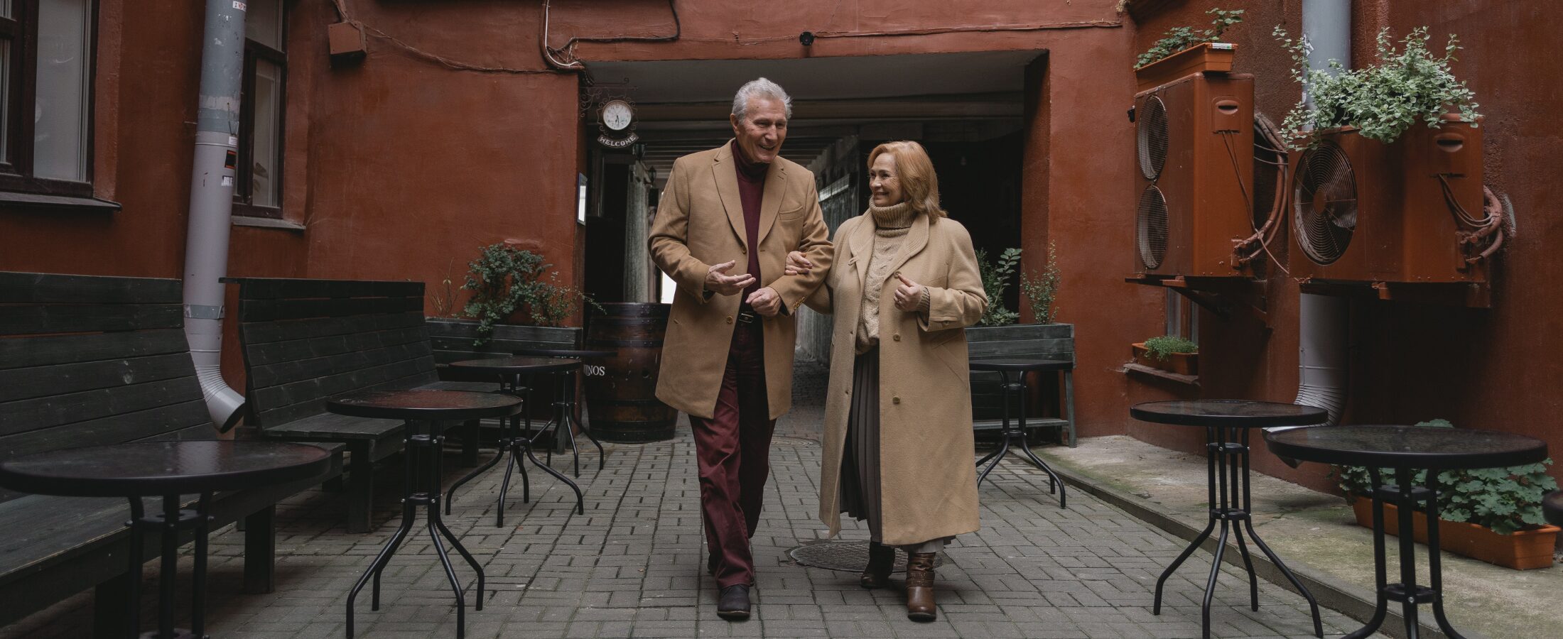 Specialising in retirement planning - a mature couples walking around the city